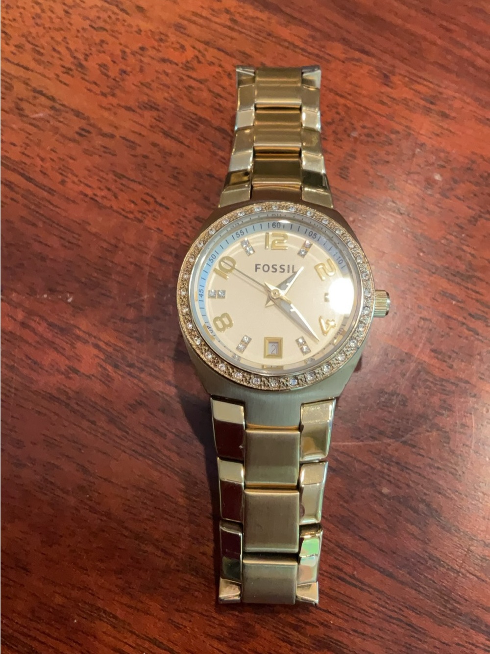 Fossil AM 4557 women’s gold tone all stainless steel three hand watch